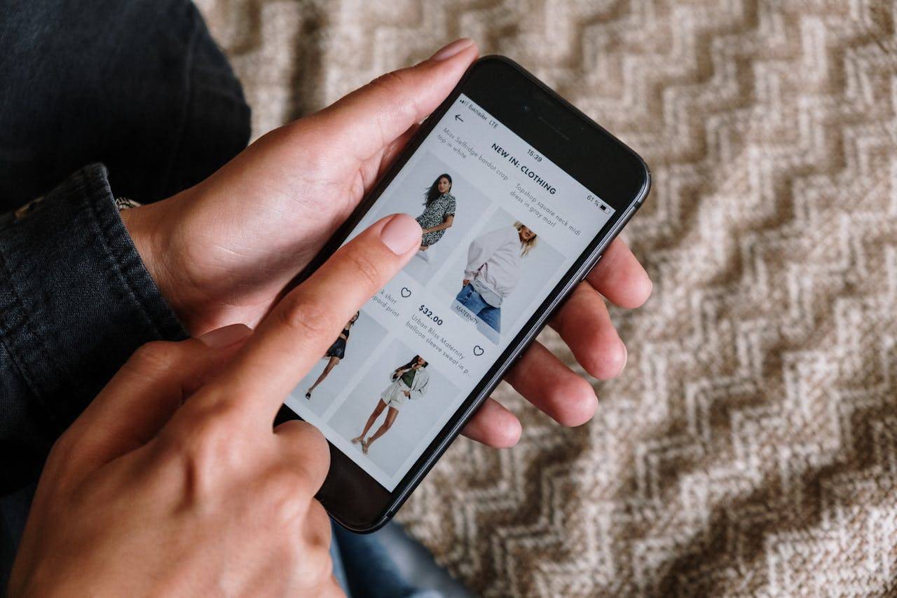 Alt text: "Instagram logo on a smartphone displaying a marketing and sales guide article"
